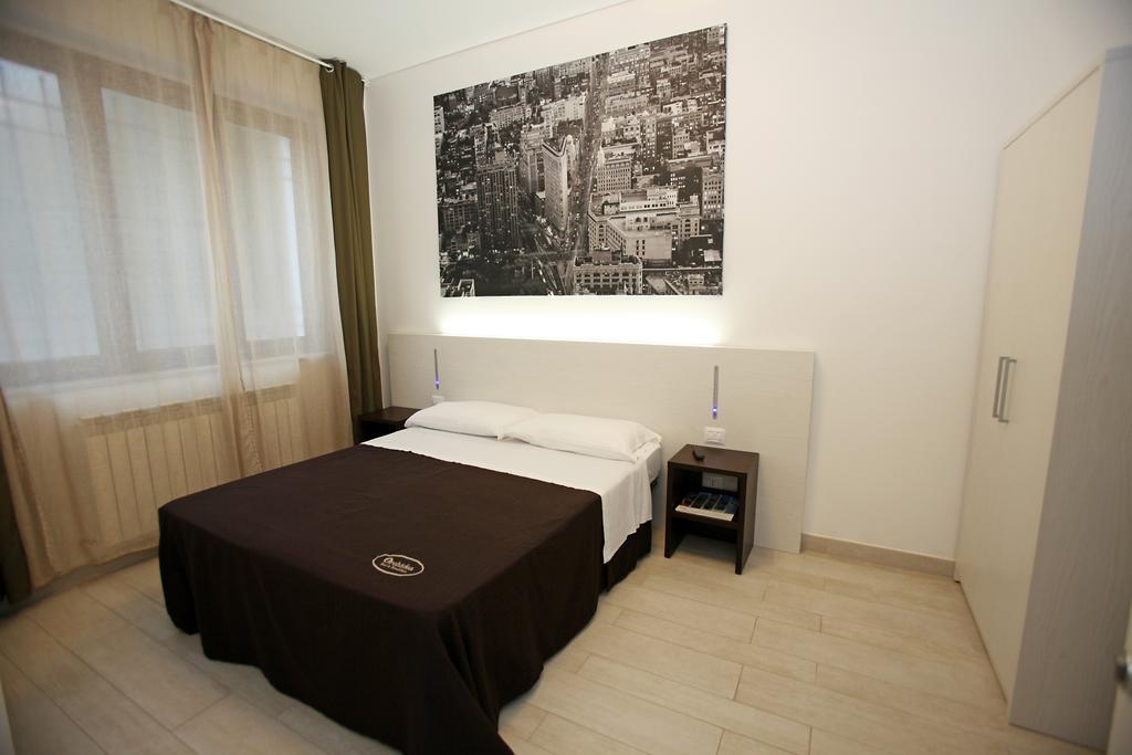 Orchidea Rooms & Suites Чивитанова-Марке Номер фото
